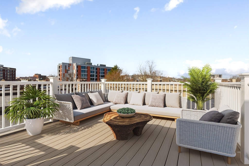 65 Pleasant Street, Unit 3 Brookline, MA 02446 - Photo 16 of 19 a terrace view with seating space