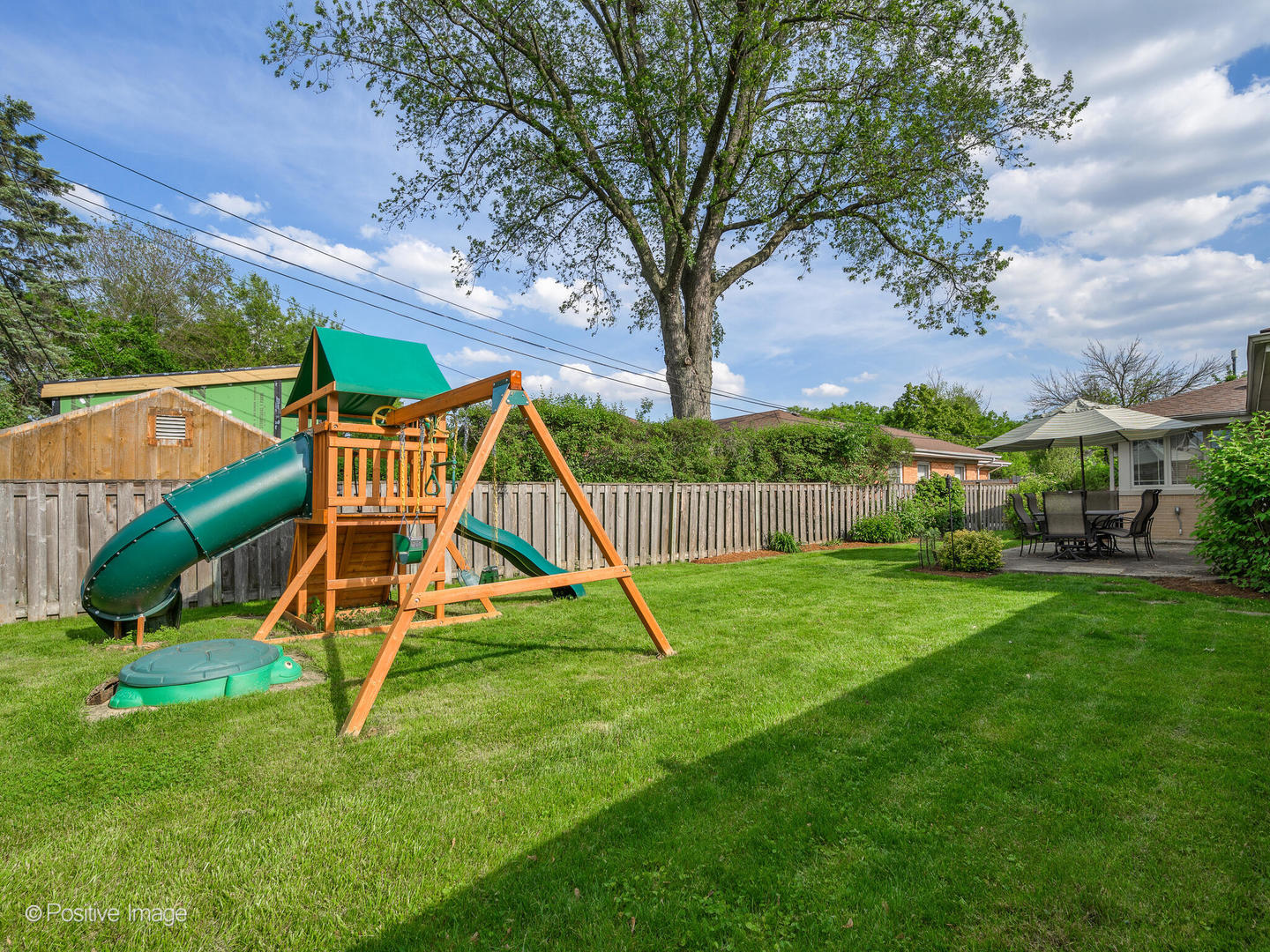 801 Windsor Road Glenview, IL 60025 - Photo 25 of 29 a view of playground with a slide and swing