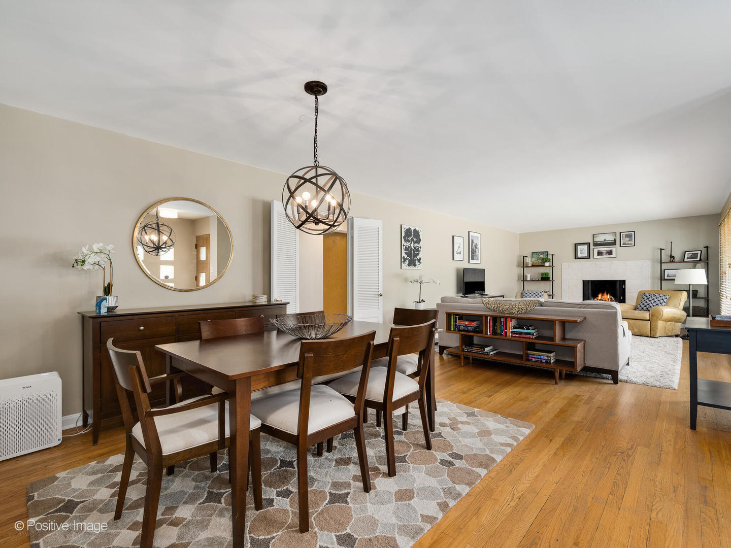 801 Windsor Road Glenview, IL 60025 - Photo 6 of 29 a living room with furniture a window and a table