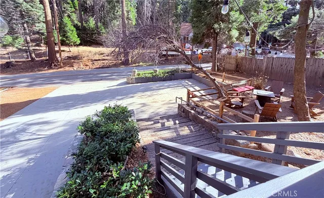 a view of a chairs and table in the patio