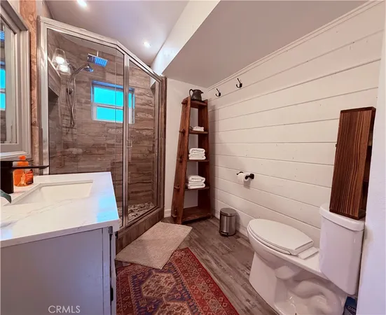 a bedroom with bed and a window