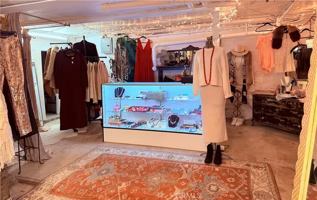 a view of a living room with stairs