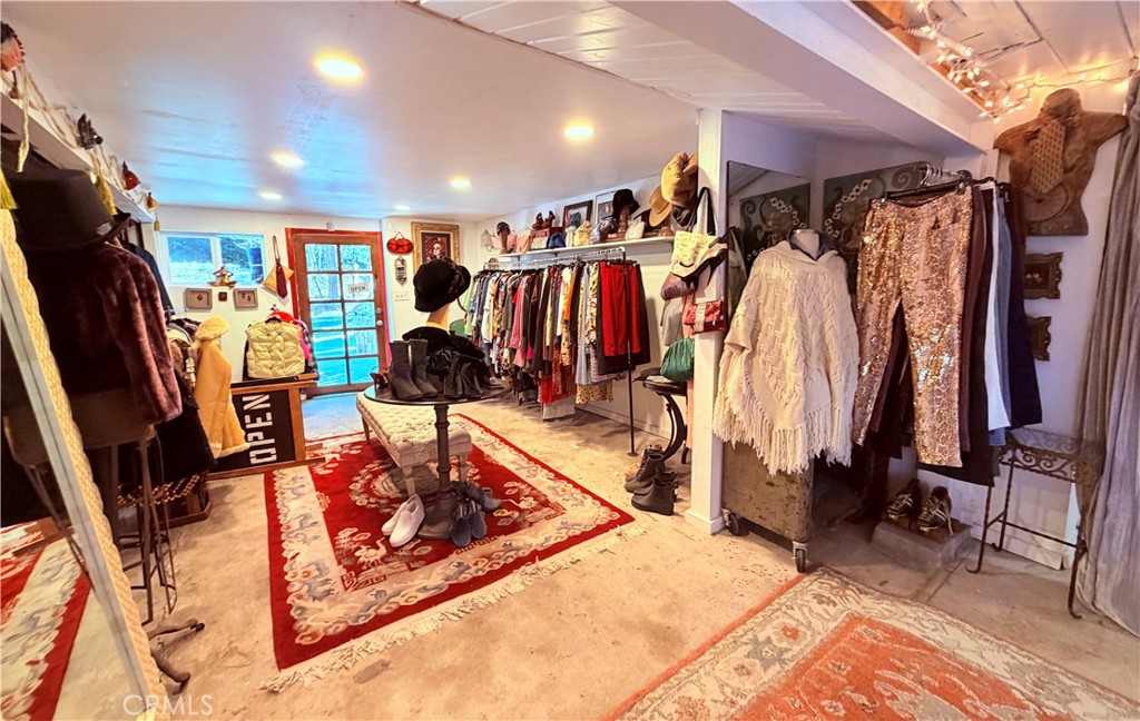 926 Kuffel Canyon Road Lake Arrowhead, CA 92385 - Photo 50 of 52 a view of a room with gym equipment