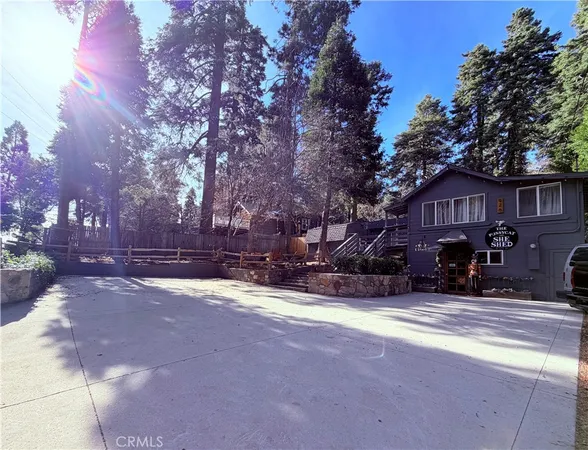 a view of patio with swimming pool