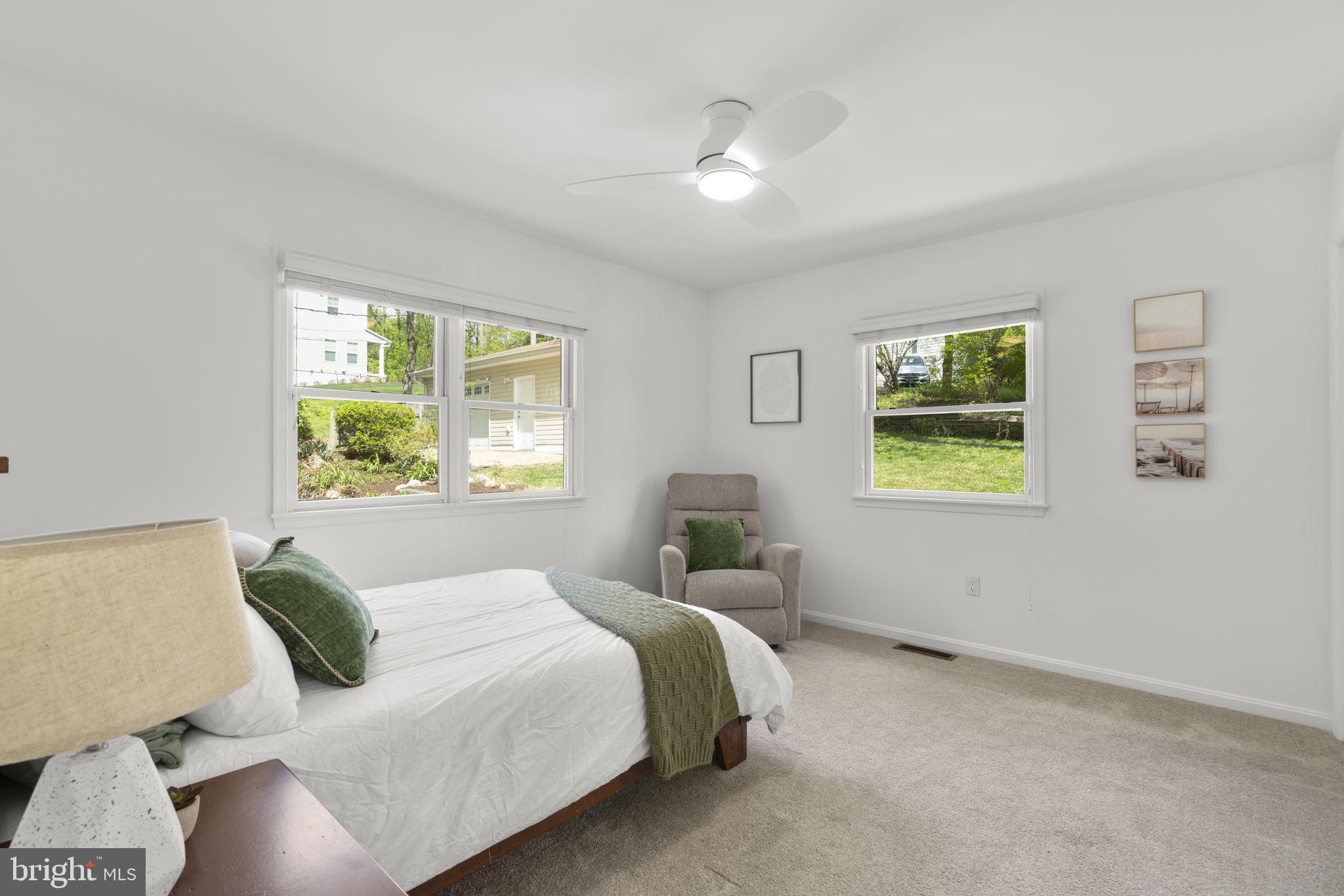 25 Leeland Road Edgewater, MD 21037 - Photo 21 of 48 a bedroom with a bed and a window