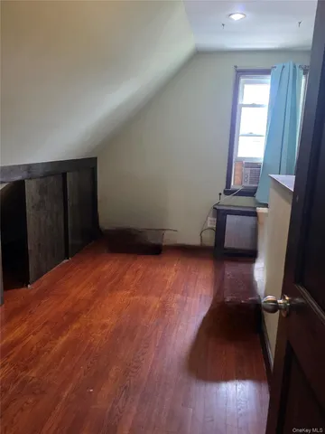 a view of empty room with windows