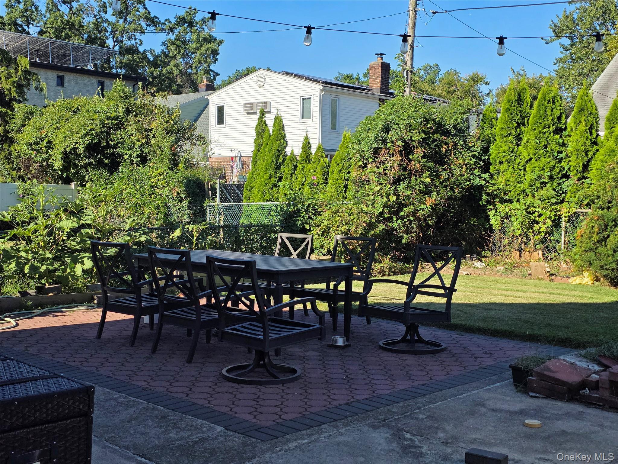 65-26 167th Street Queens, NY 11365 - Photo 15 of 15 View of patio featuring outdoor backyard space