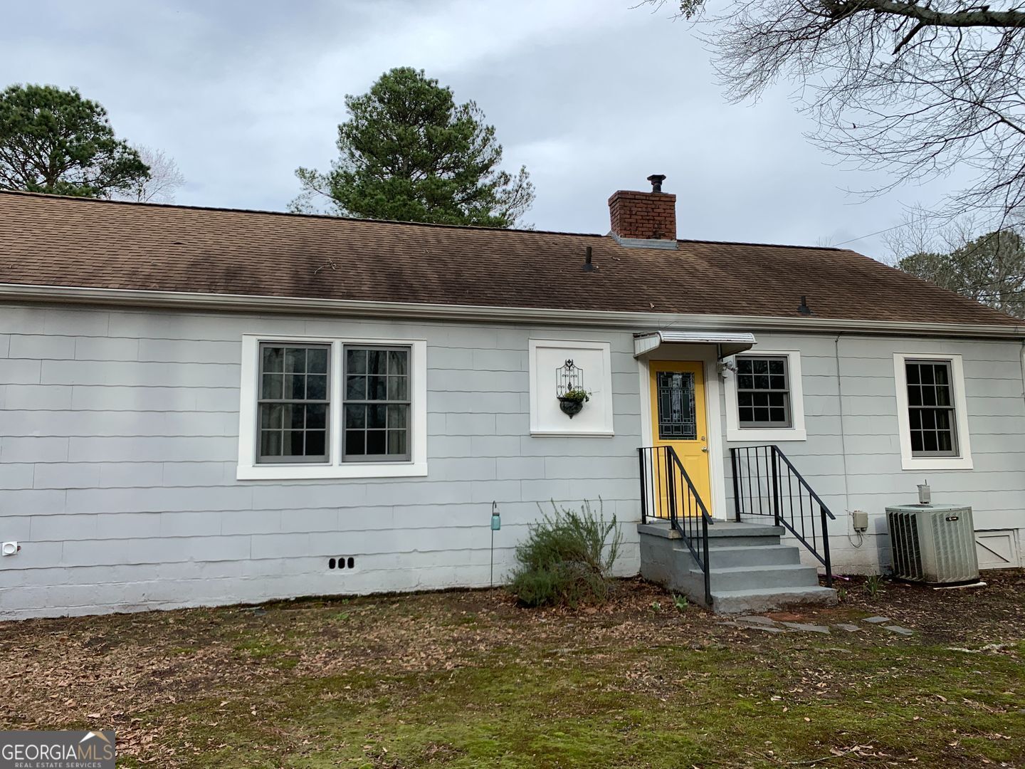 155 Windsor Court Athens, GA 30606 - Photo 14 of 14 a front view of a house with a yard