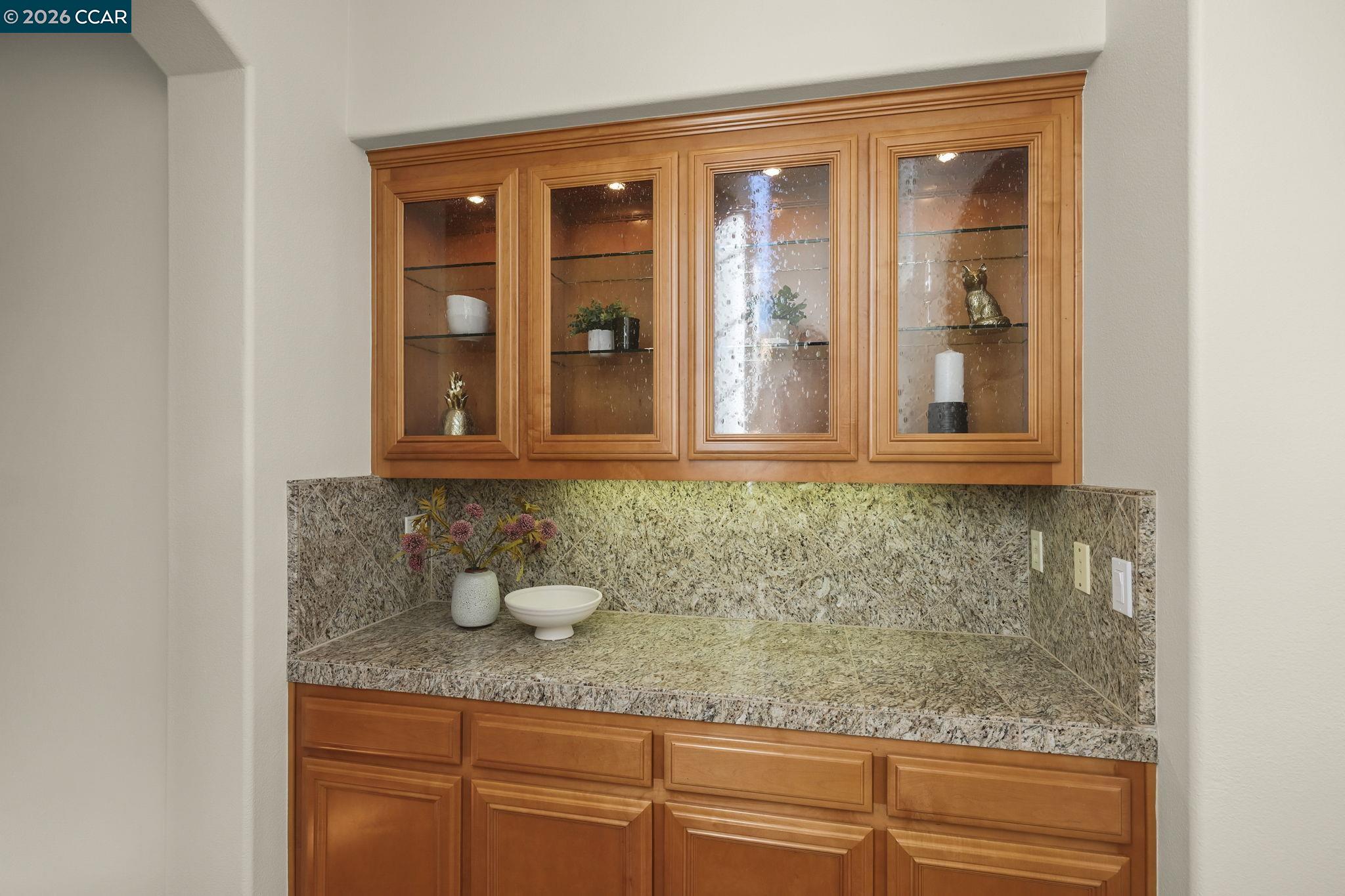 2000 Sorrelwood Court San Ramon, CA 94582 - Photo 13 of 42 a bathroom with a granite countertop sink and mirror