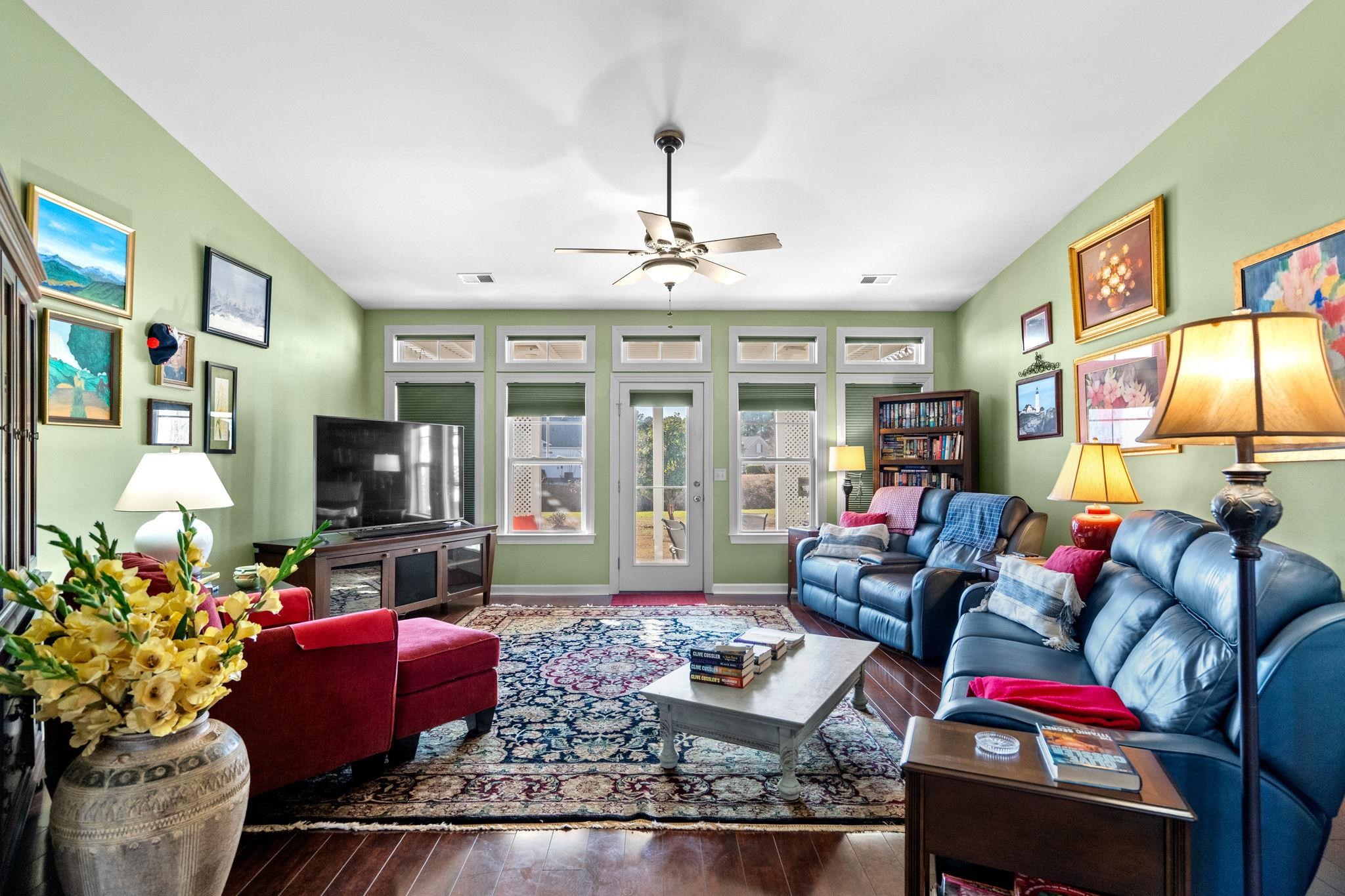 699 Bullrush Court Calabash, NC 28467 - Photo 19 of 40 Living room featuring ceiling fan and hardwood / wood-style flooring