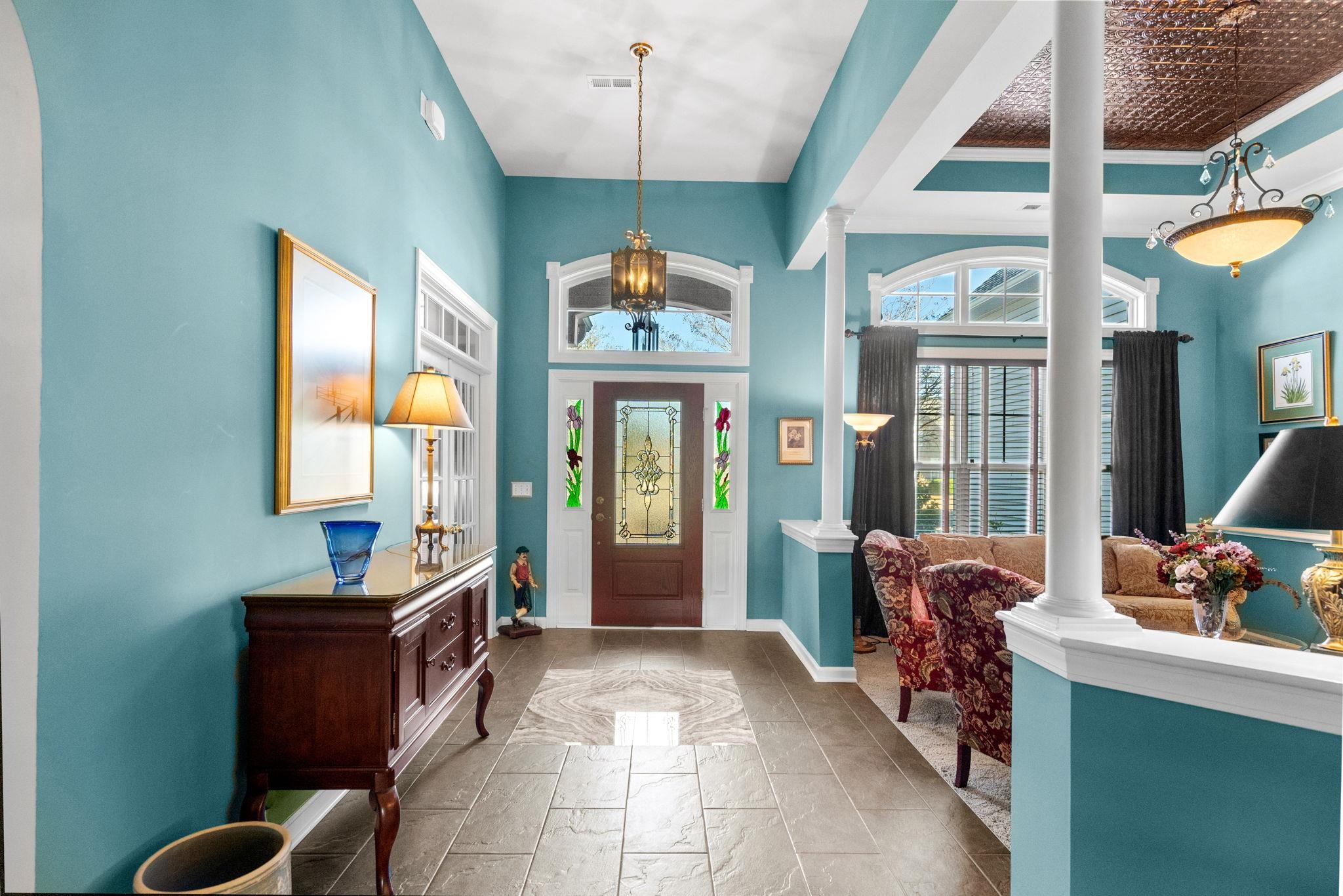 699 Bullrush Court Calabash, NC 28467 - Photo 2 of 40 Foyer entrance featuring decorative columns and marble finish flooring