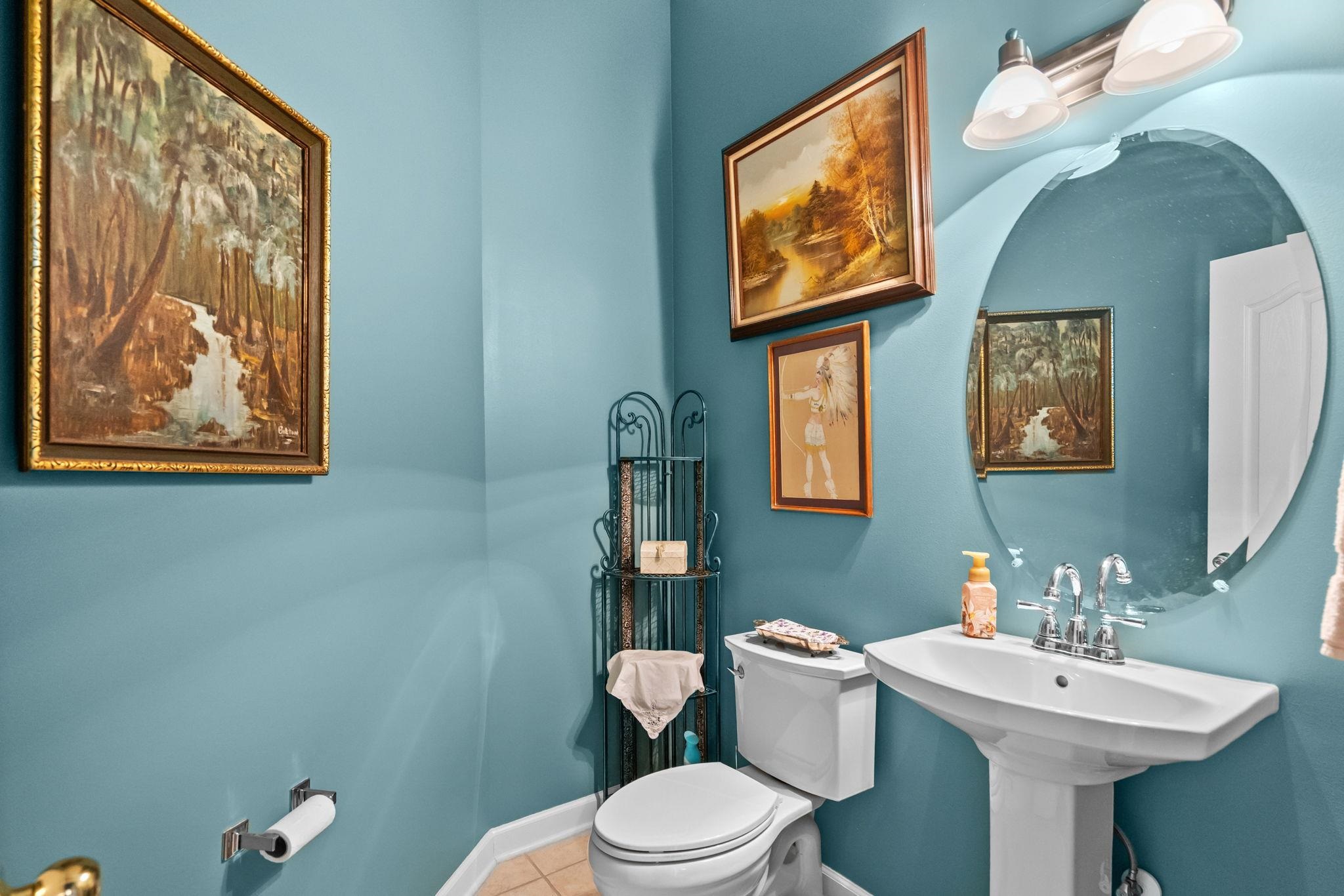 699 Bullrush Court Calabash, NC 28467 - Photo 24 of 40 Half bath featuring toilet and tile patterned floors