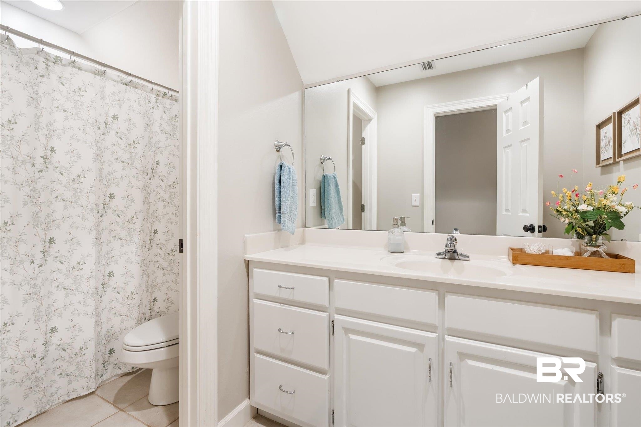 30648 Pine Court Daphne, AL 36527 - Photo 22 of 30 Bathroom with vanity, tile patterned flooring, and toilet