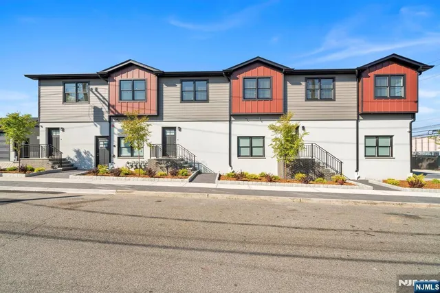 a view of street along with houses