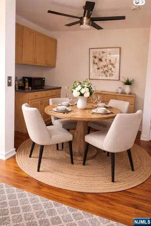 a view of a dining room with furniture