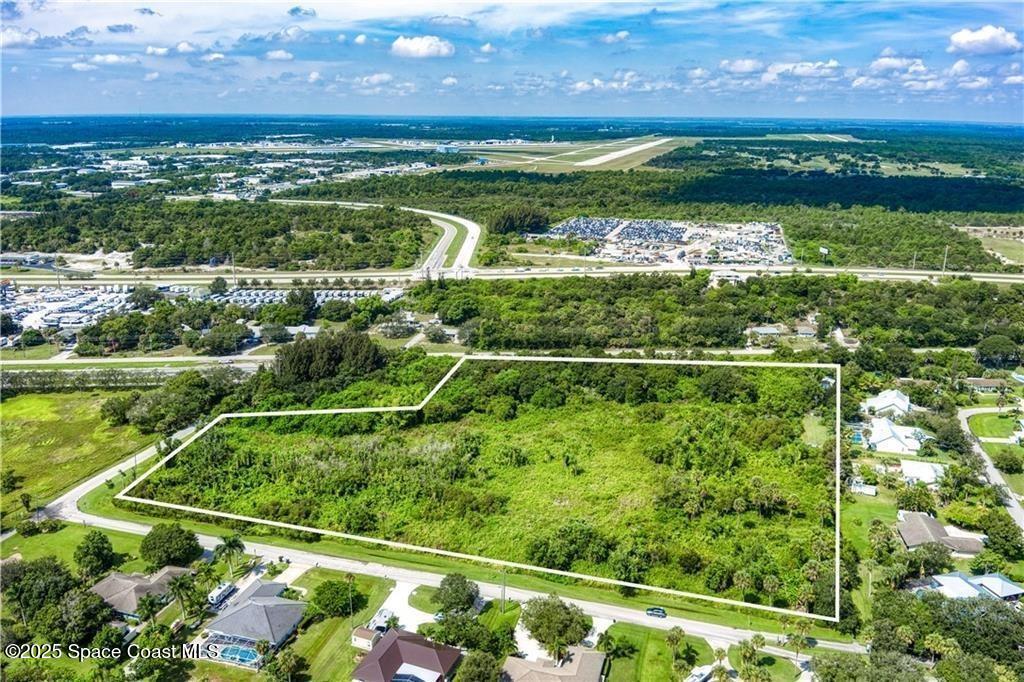 0 Milton Road & River Woods Drive, FL 00000 - Photo 16 of 36 a view of a yard with a lake