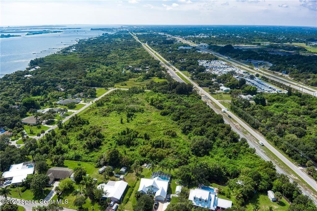 0 Milton Road & River Woods Drive, FL 00000 - Photo 18 of 36 a view of a city with lush green forest