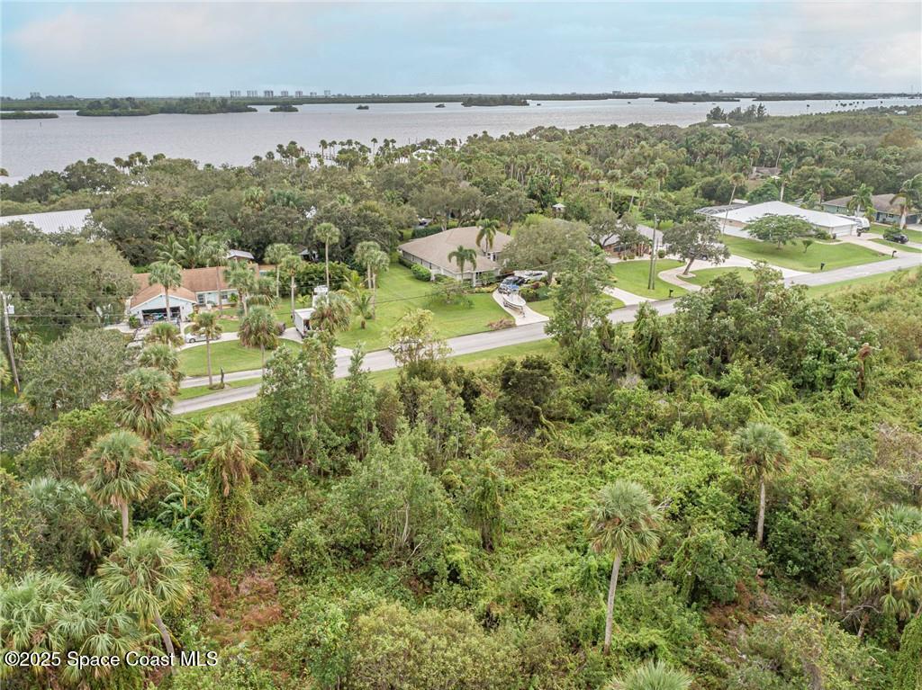 0 Milton Road & River Woods Drive, FL 00000 - Photo 19 of 36 a view of a lake with a city