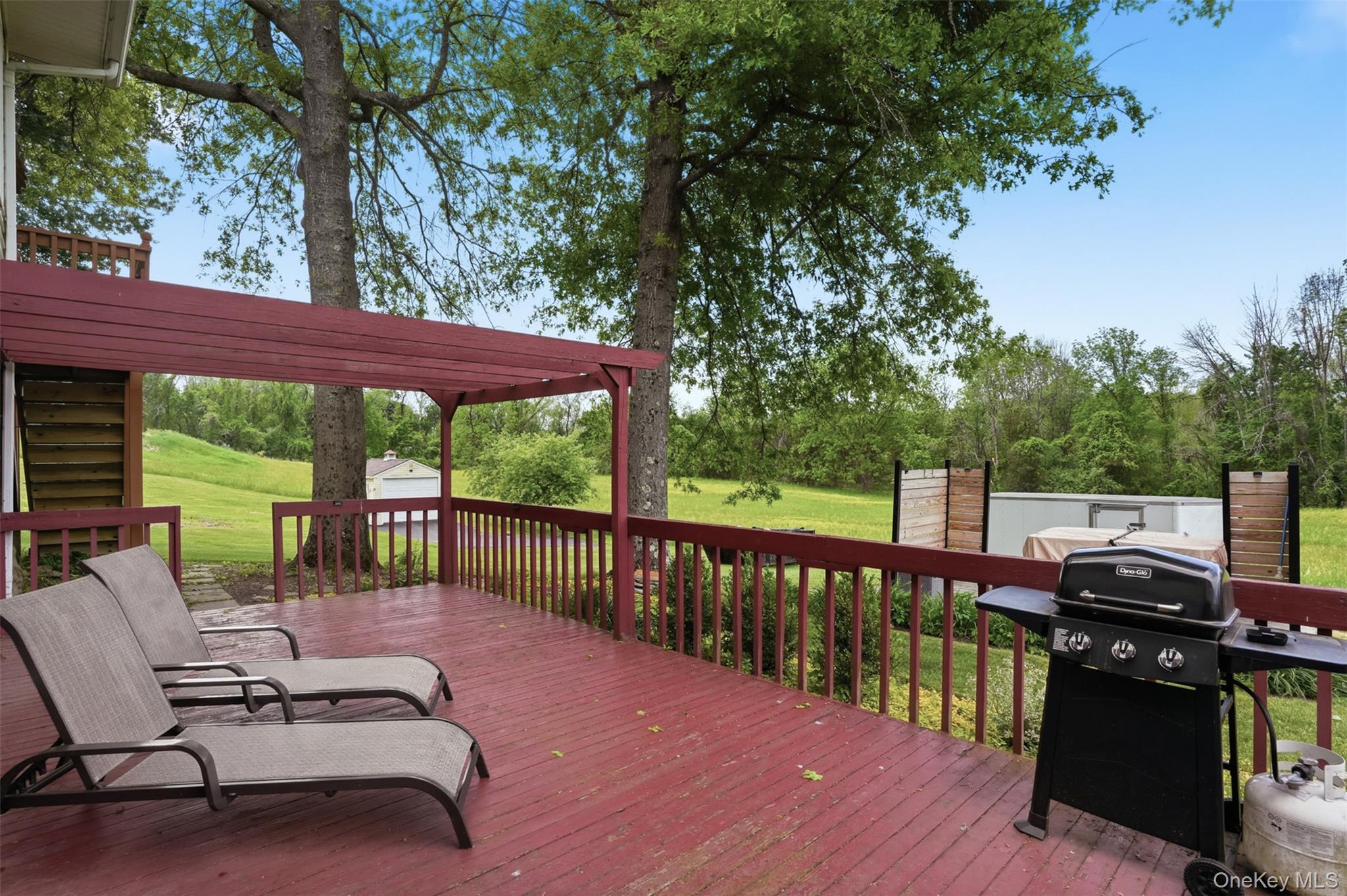 23 Old Cross Road Warwick, NY 10990 - Photo 29 of 34 Accessed from the lower level, this deck is perfect for summer barbecues or relaxing with a book and beverage