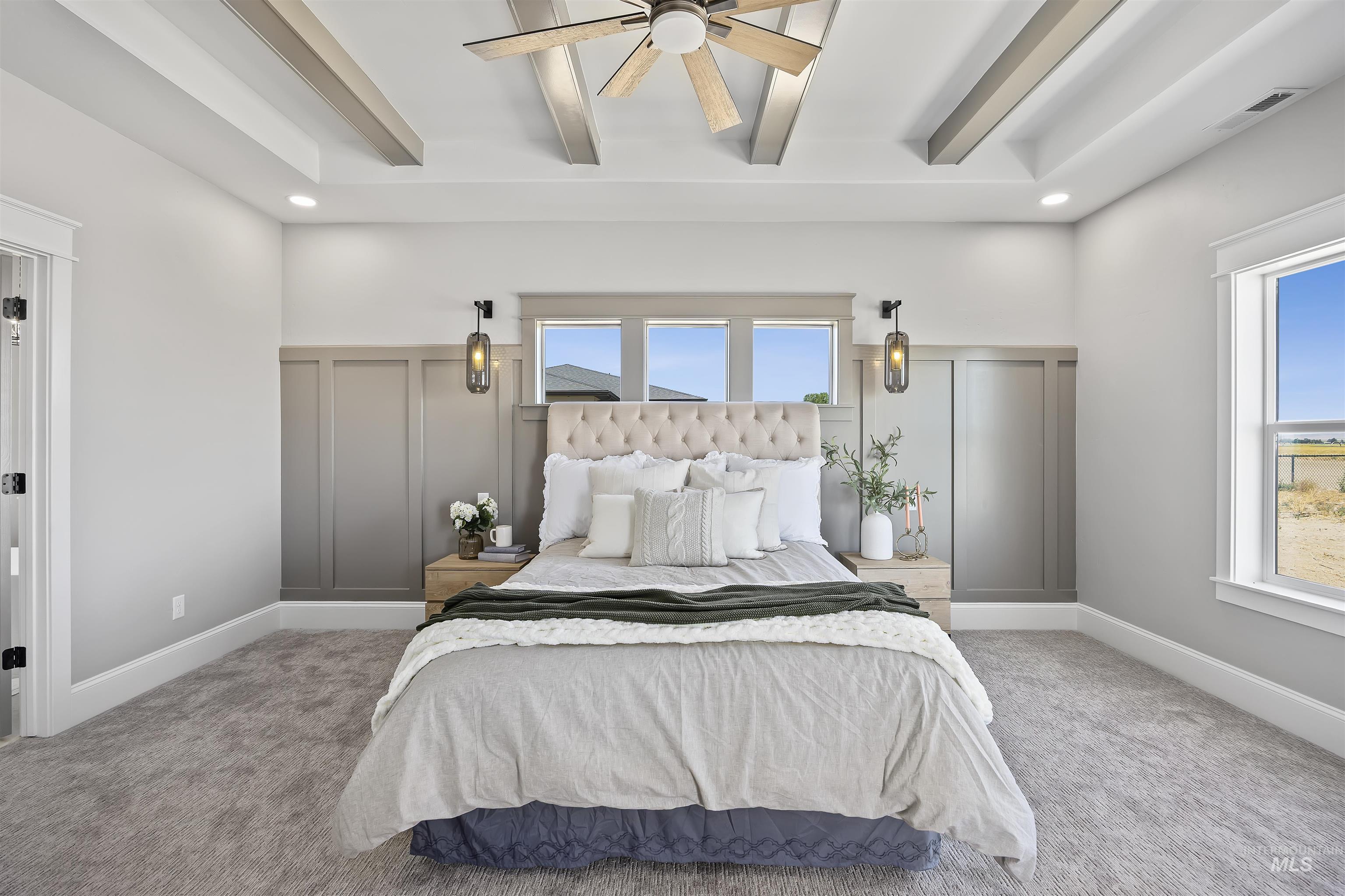 378 West 100 South Rupert, ID 83350 - Photo 20 of 50 Recessed ceiling with decorative wood-finish beams and a ceiling fan