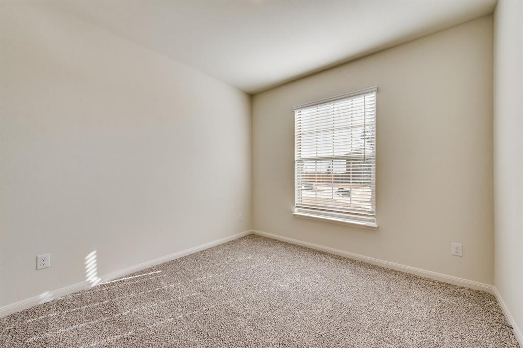 9813 Dan Meyer Drive Fort Worth, TX 76140 - Photo 6 of 8 a view of an empty room with a window