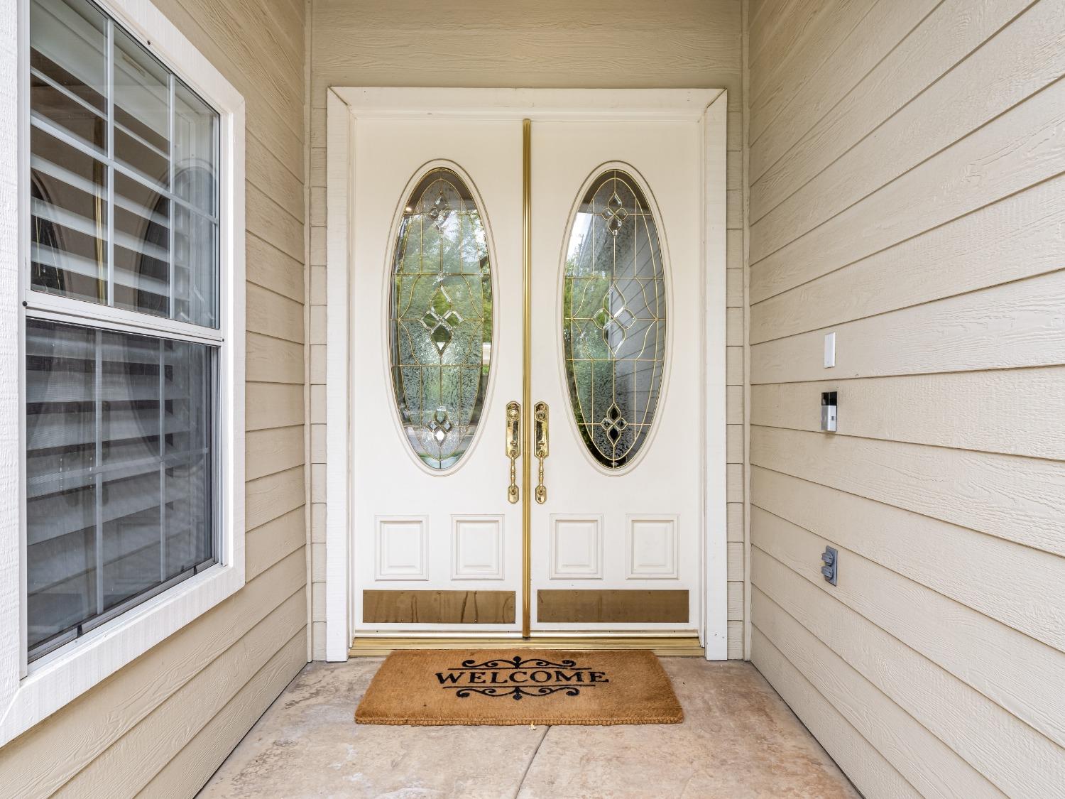 371 West Warwick Avenue Clovis, CA 93619 - Photo 3 of 42 a view of a door of the house