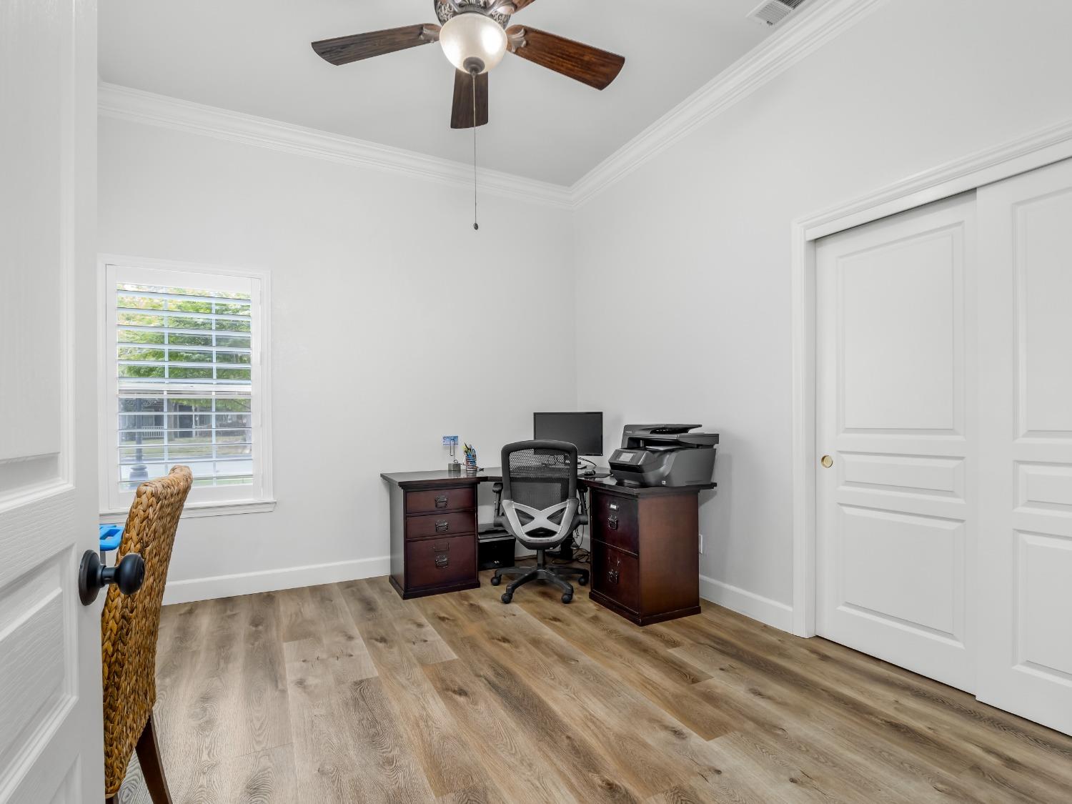 371 West Warwick Avenue Clovis, CA 93619 - Photo 33 of 42 a view of a workspace with furniture and a window
