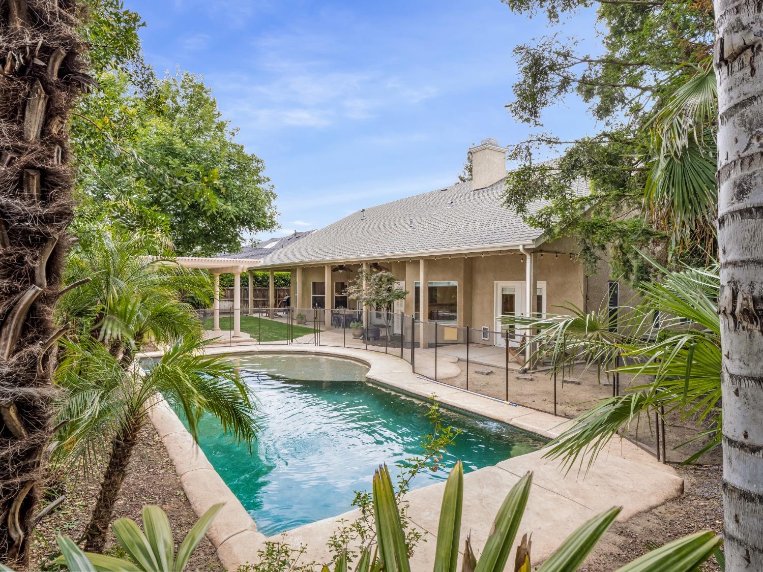 371 West Warwick Avenue Clovis, CA 93619 - Photo 34 of 42 a view of a house with backyard sitting area and swimming pool