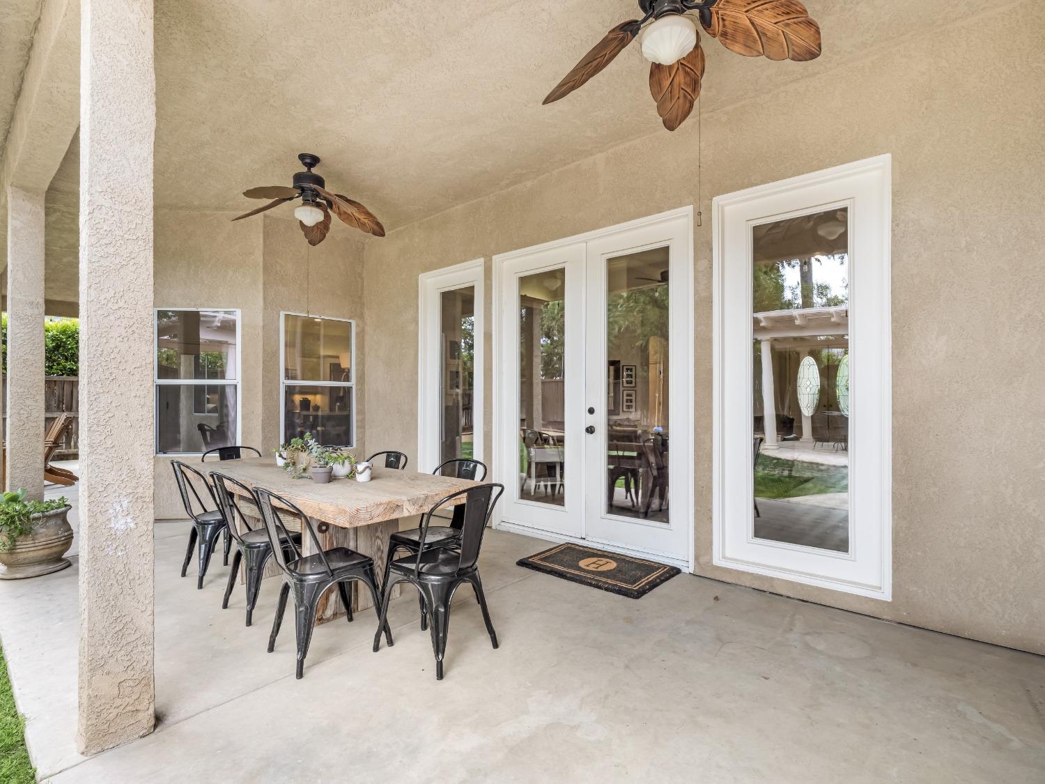 371 West Warwick Avenue Clovis, CA 93619 - Photo 37 of 42 a view of a dining room with furniture window and outside view