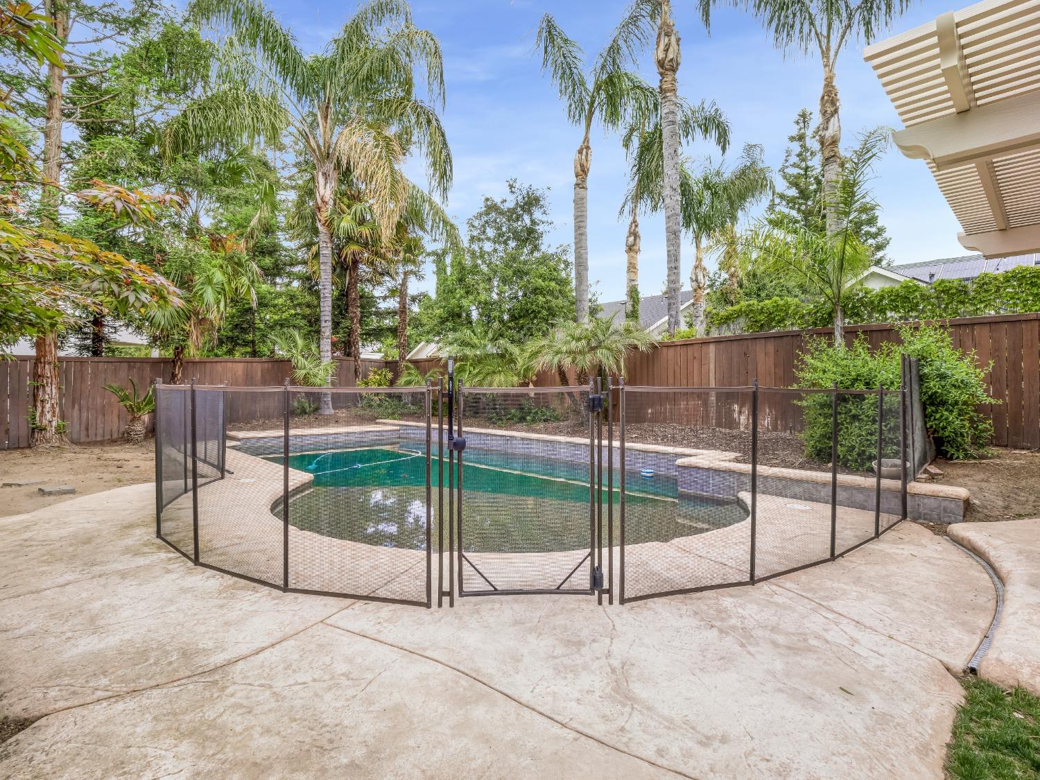 371 West Warwick Avenue Clovis, CA 93619 - Photo 39 of 42 a view of backyard with trampoline