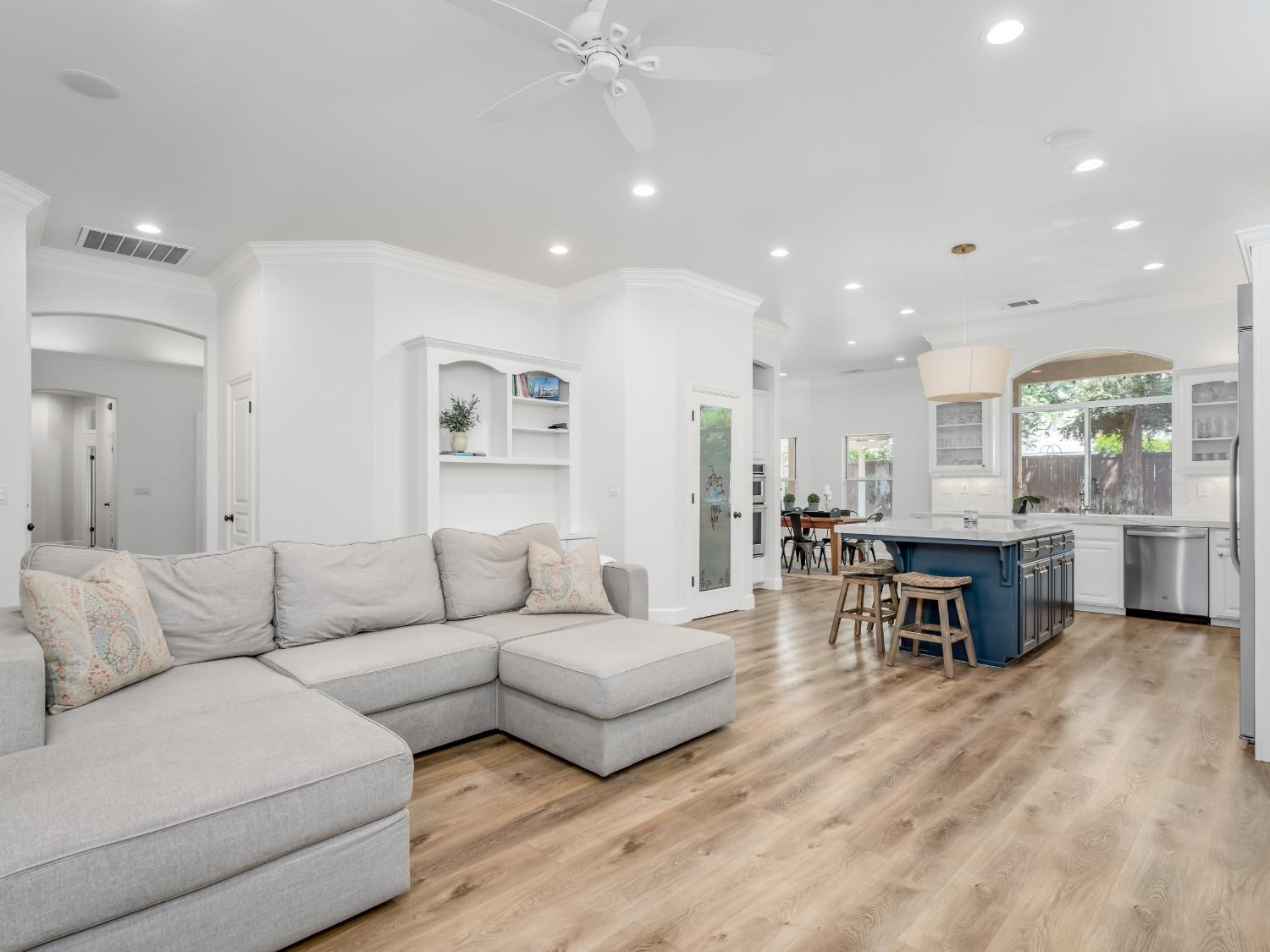 371 West Warwick Avenue Clovis, CA 93619 - Photo 10 of 42 a living room with furniture and wooden floor