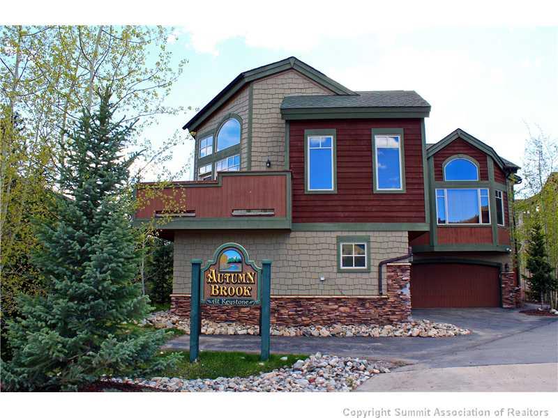 18 Rasor Drive, Unit 18 Keystone, CO 80435 - Photo 1 of 18 a front view of a house with garden