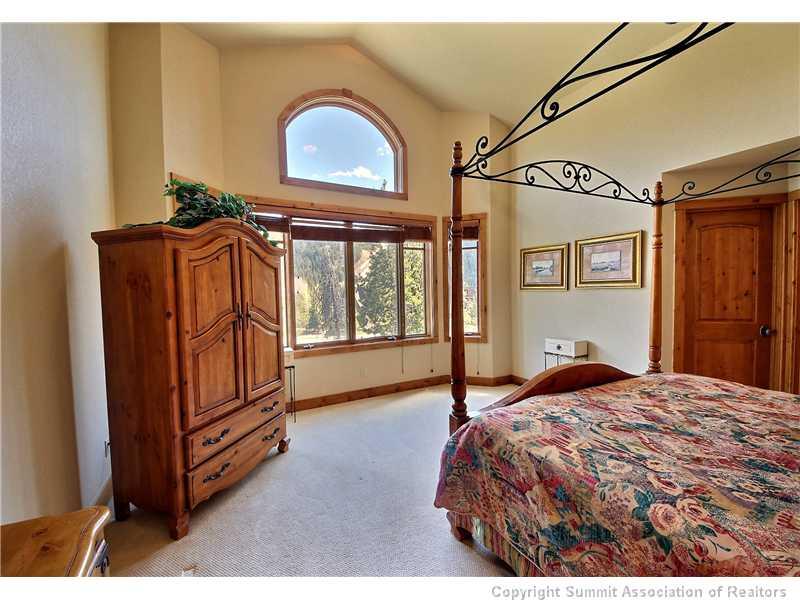 18 Rasor Drive, Unit 18 Keystone, CO 80435 - Photo 8 of 18 a bedroom with a bed next to a window
