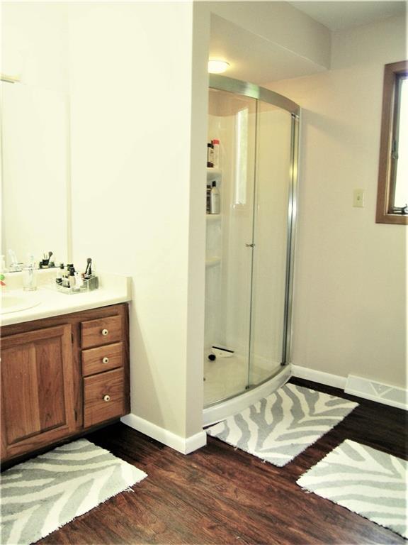 325 Inwood Road Pittsburgh, PA 15237 - Photo 9 of 19 En suite Master Bath with updated shower and laminate flooring1