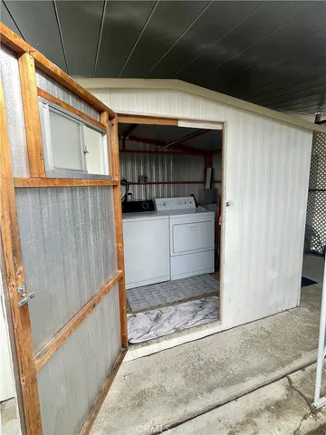 a view of backyard with deck and wooden floor