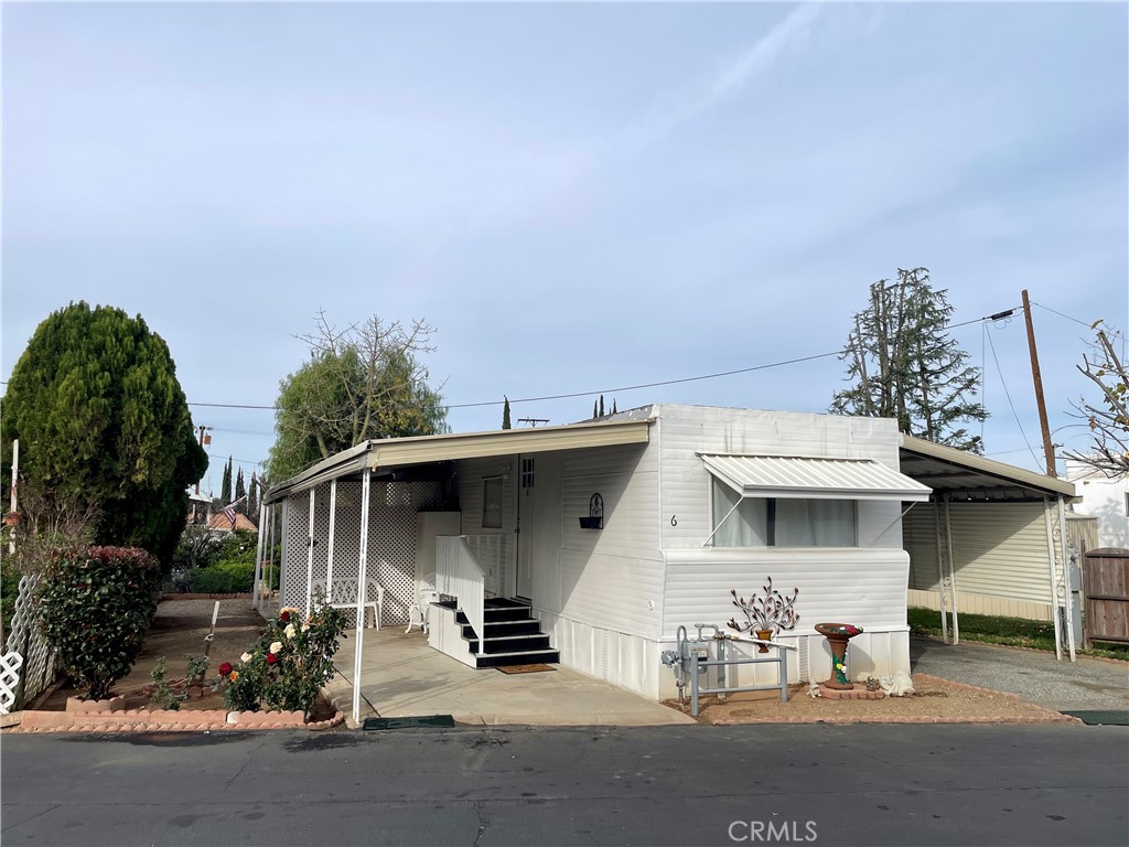 12995 6th Street Yucaipa, CA 92399 - Photo 2 of 13 a view of a car park in front of house