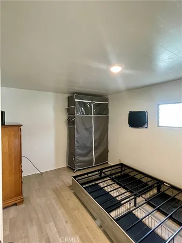 a kitchen with a refrigerator and a stove