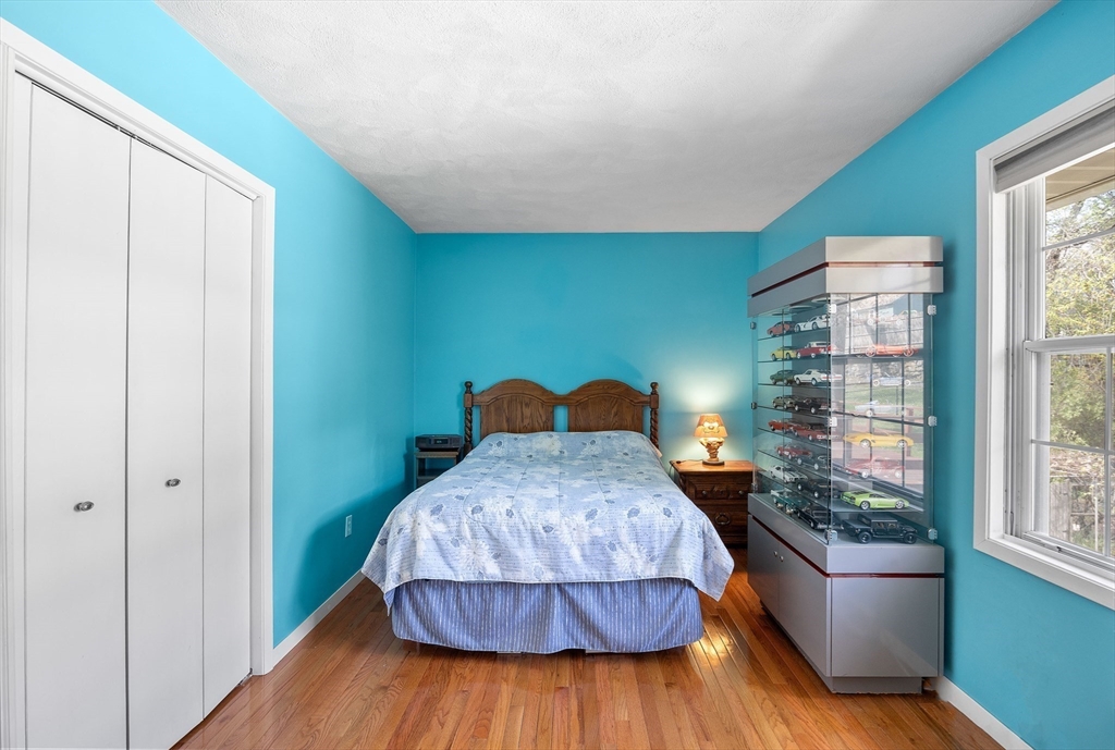 85 Tower Street Hudson, MA 01749 - Photo 11 of 25 a living room with furniture and a window