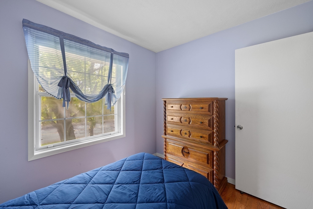 85 Tower Street Hudson, MA 01749 - Photo 14 of 25 wooden floor in an empty room with a window
