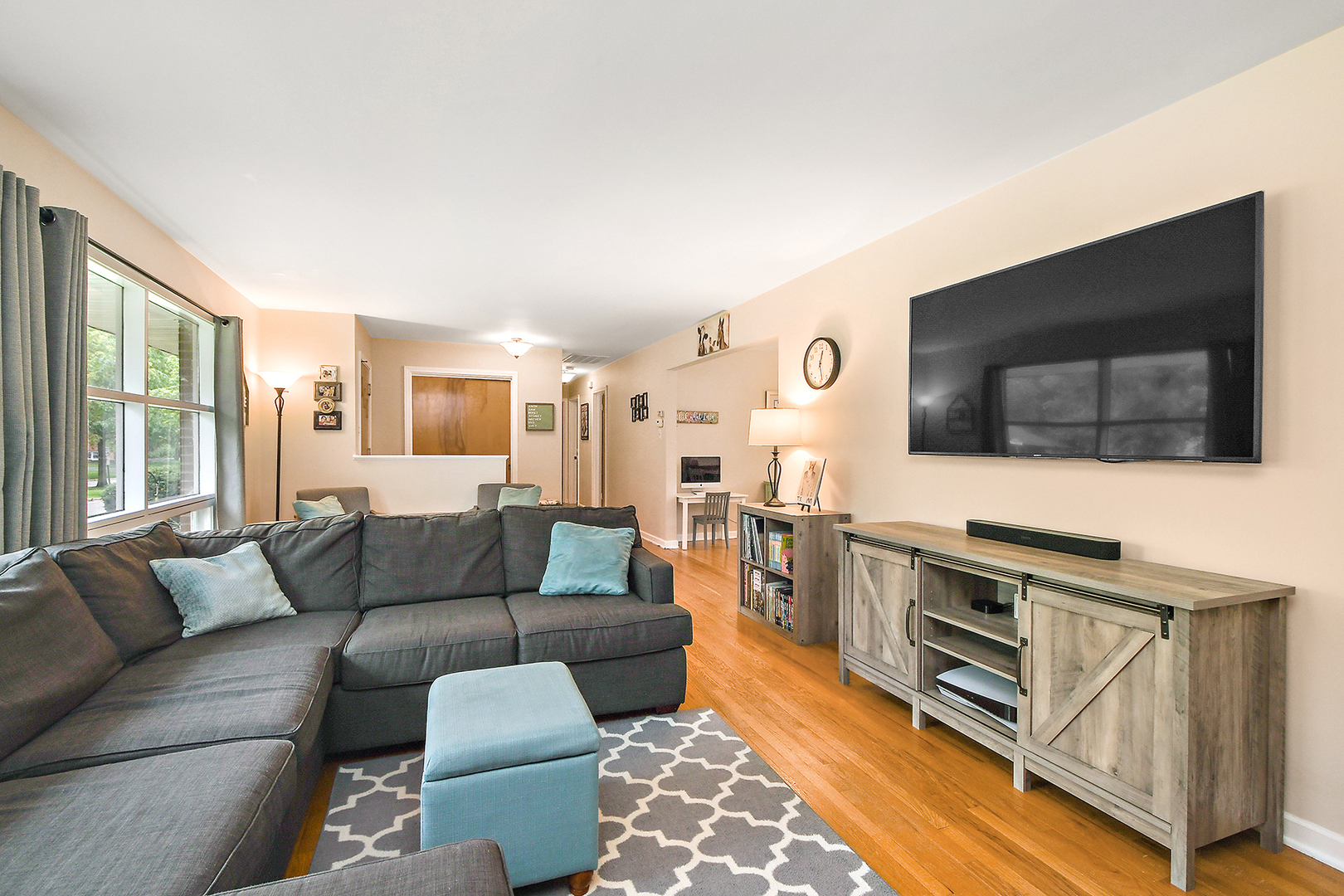 2724 Heather Road Homewood, IL 60430 - Photo 8 of 29 a living room with furniture and a flat screen tv