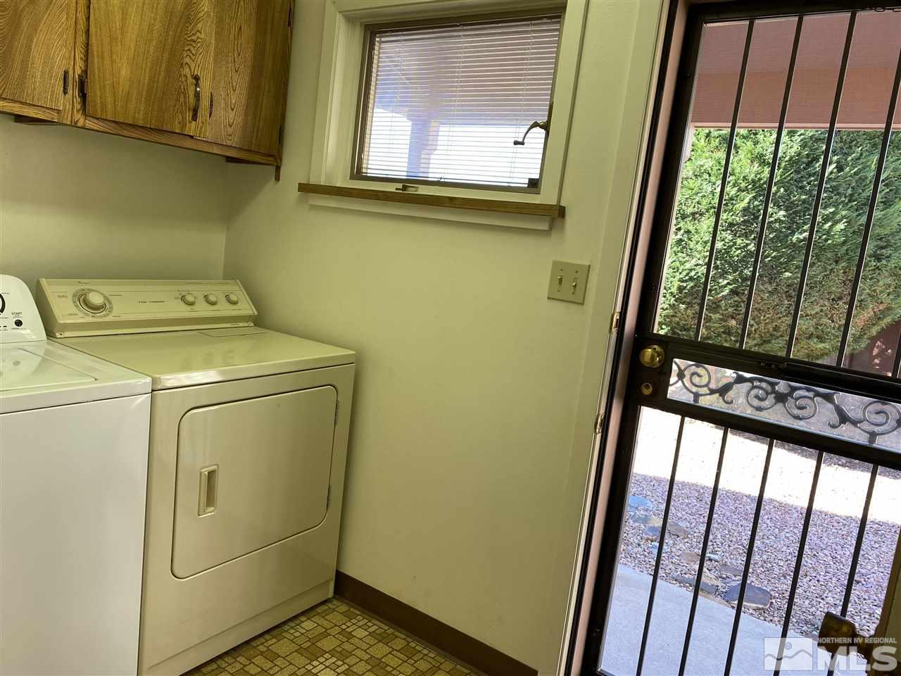 3900 Buckingham Square Reno, NV 89503 - Photo 30 of 35 a utility room with dryer and washer