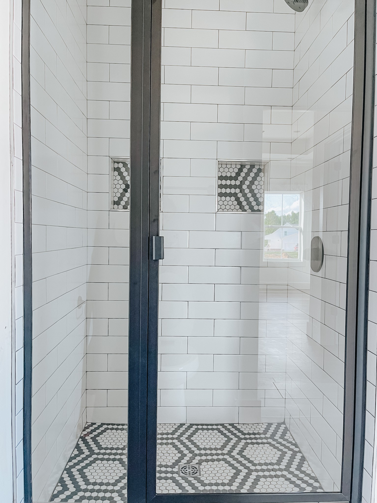 1402 Fowler Ford Road Portland, TN 37148 - Photo 22 of 27 a bathroom with a shower
