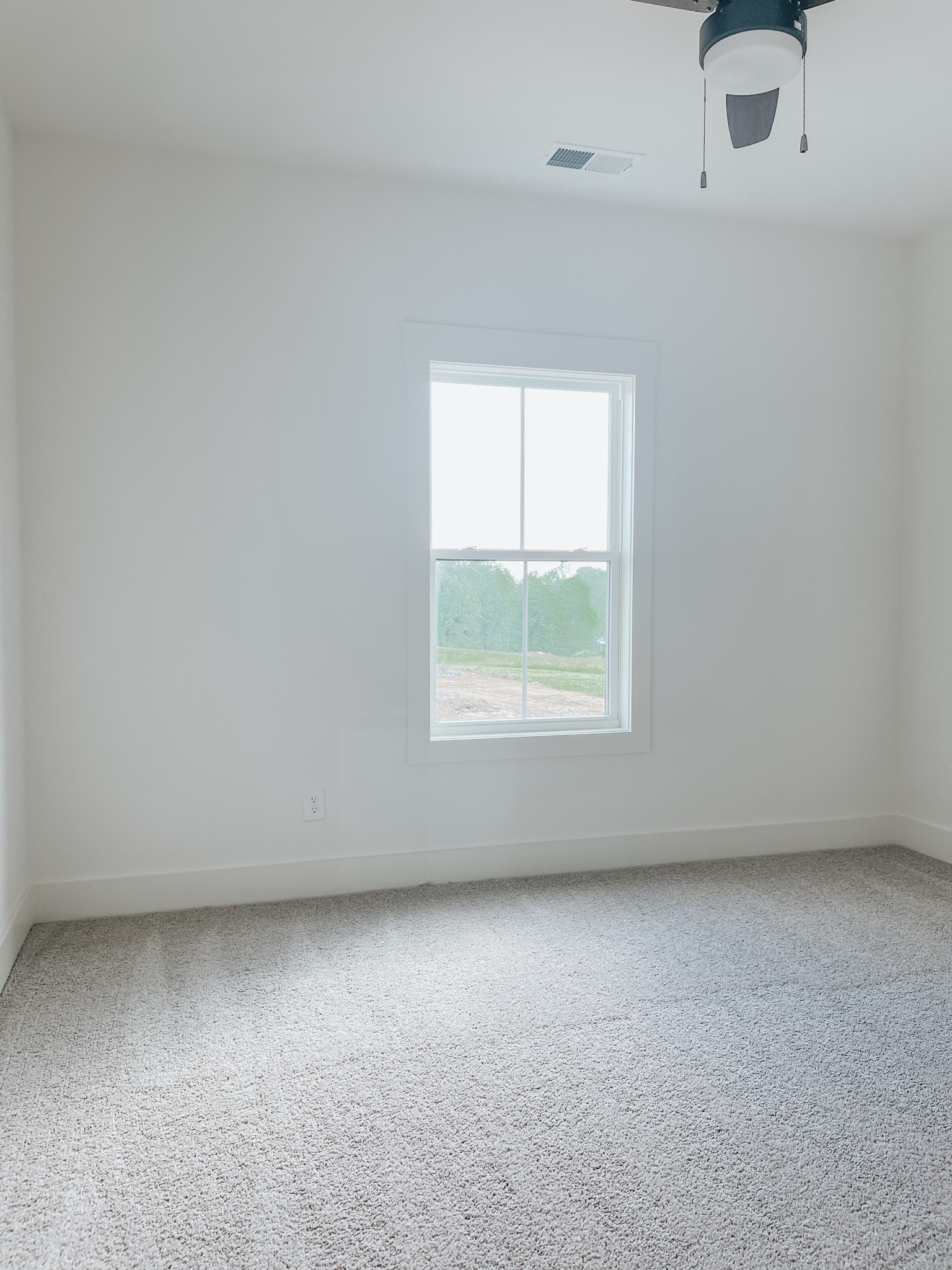 1402 Fowler Ford Road Portland, TN 37148 - Photo 24 of 27 an empty room with a window