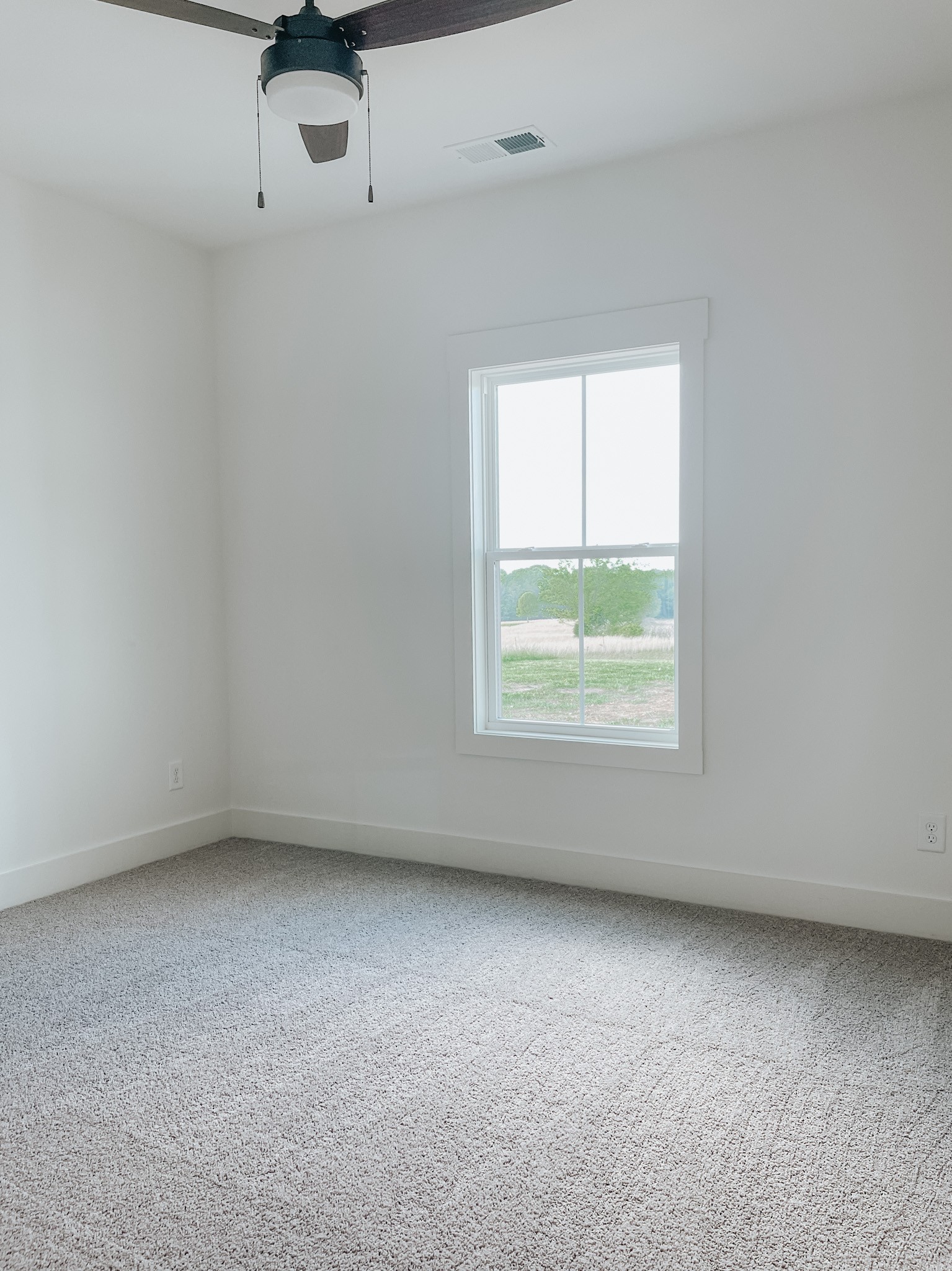 1402 Fowler Ford Road Portland, TN 37148 - Photo 26 of 27 an empty room with a window
