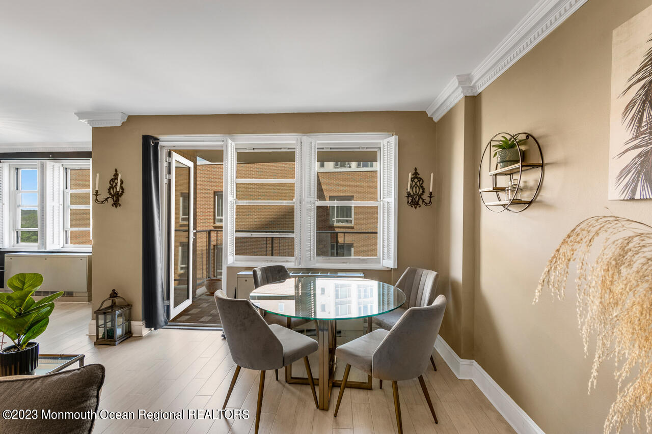 28 Riverside Avenue, Unit 4J Red Bank, NJ 07701 - Photo 6 of 18 a dining room with furniture and window