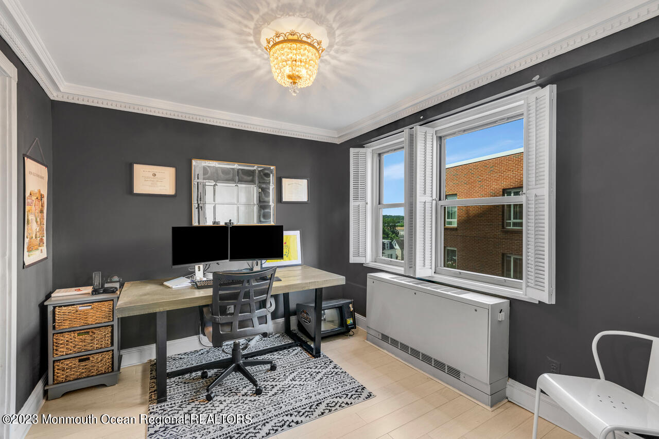 28 Riverside Avenue, Unit 4J Red Bank, NJ 07701 - Photo 8 of 18 a workspace with furniture and a window
