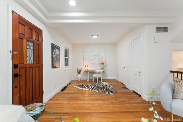 a living room with furniture and window