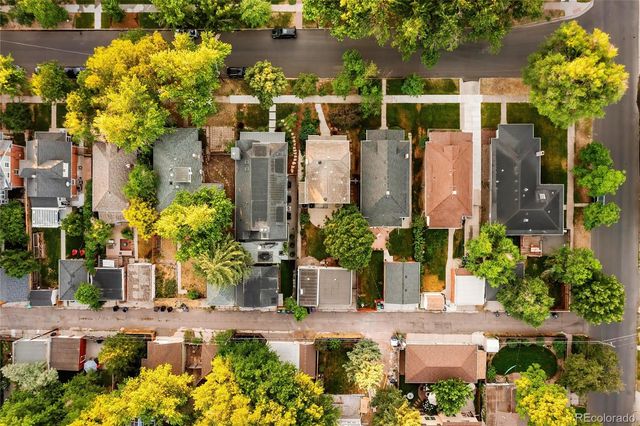 an aerial view of residential building with parking space