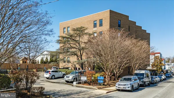 a car parked in front of a building