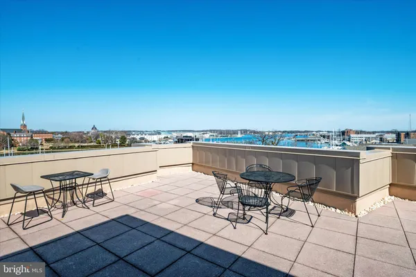 a view of a terrace with seating area